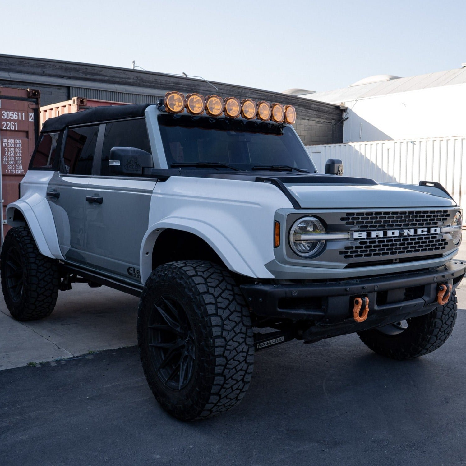 2021-2024 Ford Bronco 4-Door Rear Quarter Kit on a modified Bronco with off-road tires and a light bar.