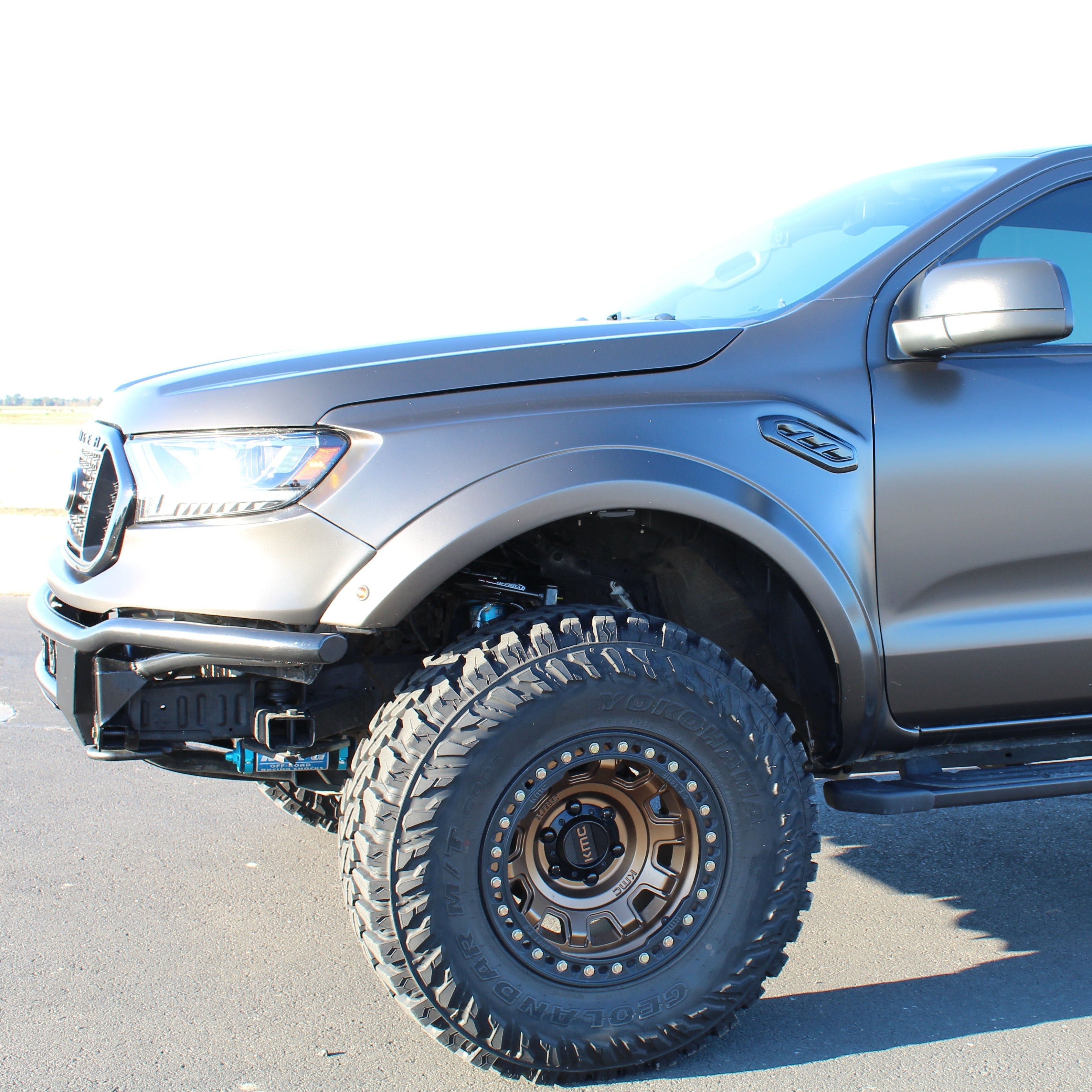 2019-2022 Ford Ranger fenders on a modified truck with oversized tires, showcasing rugged offroad capability.