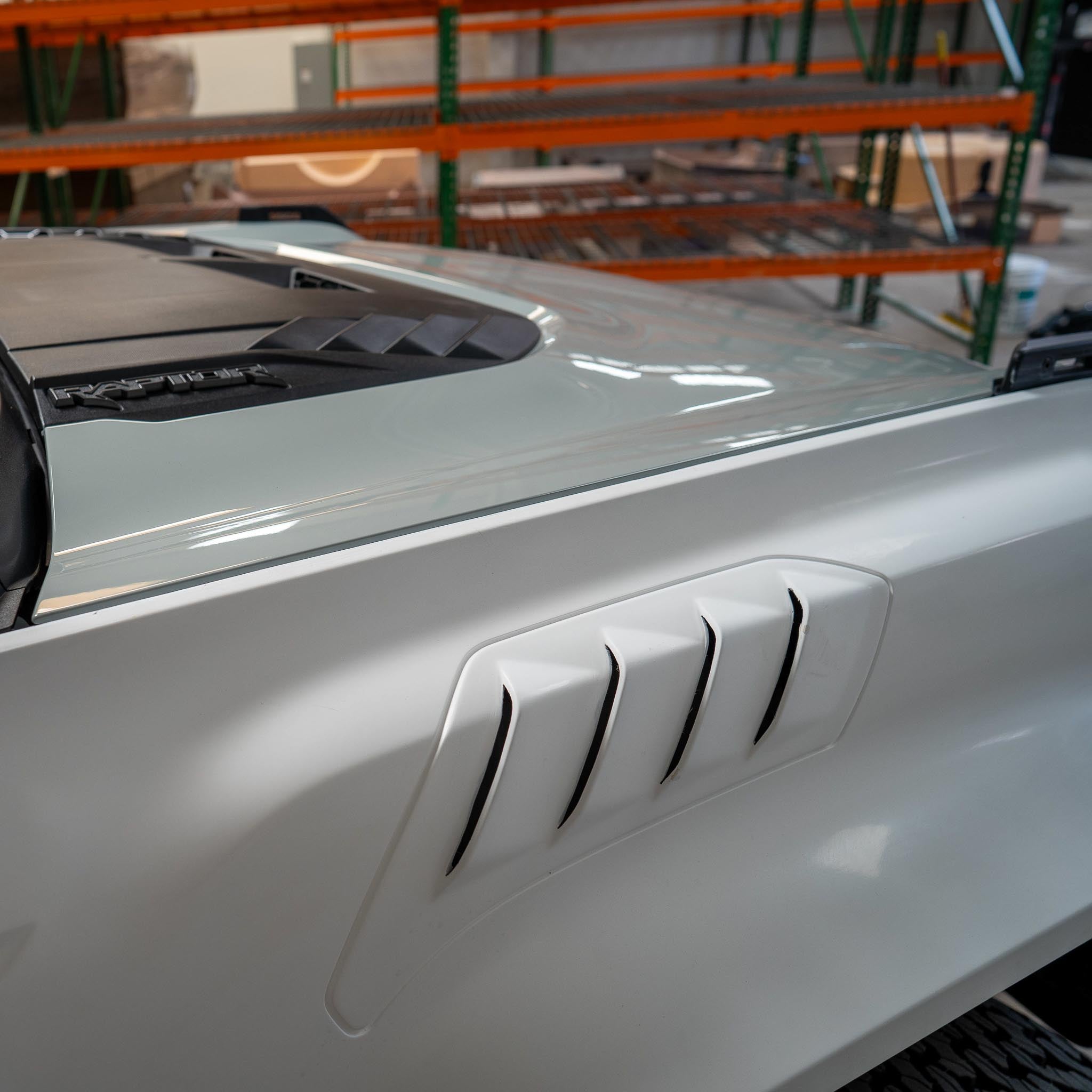 2022-2024 Ford Bronco Raptor fenders showcasing sleek design and ventilation features for enhanced performance.