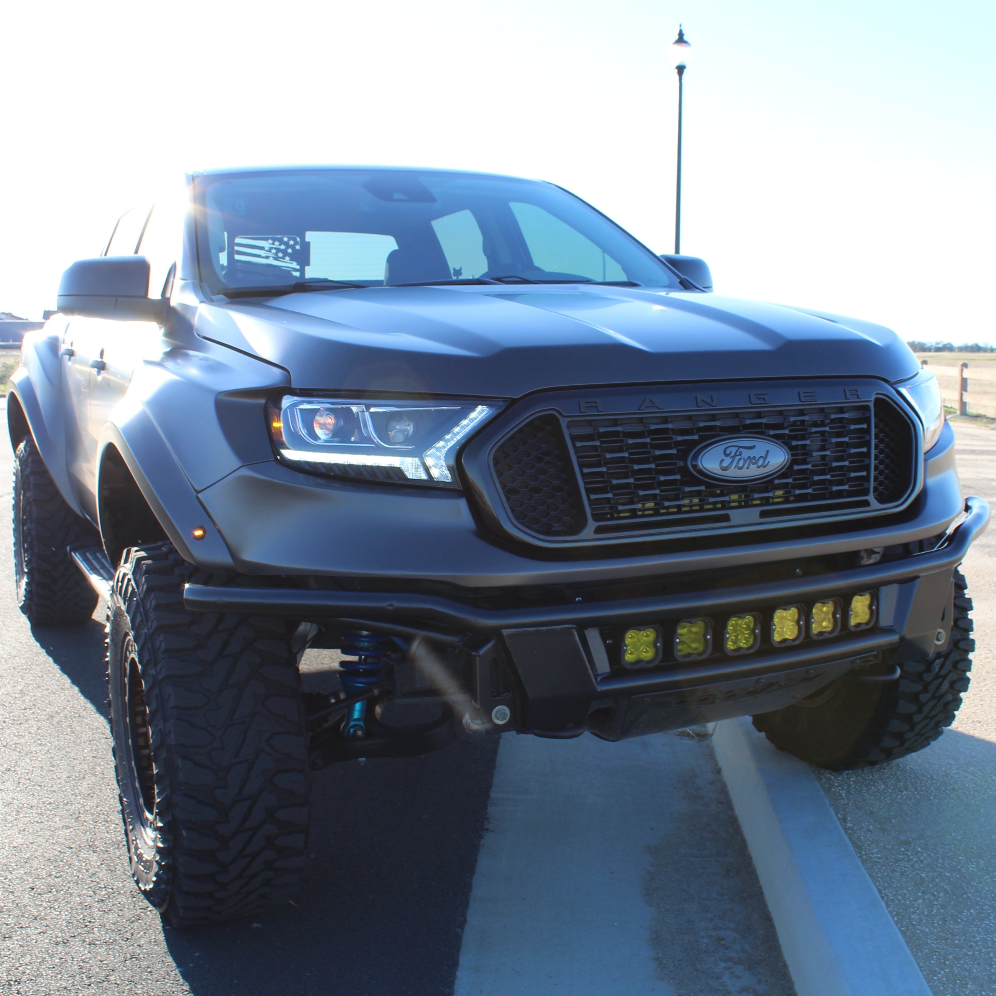 2019-2022 Ford Ranger fenders displayed on a modified truck with offroad features and rugged tires.