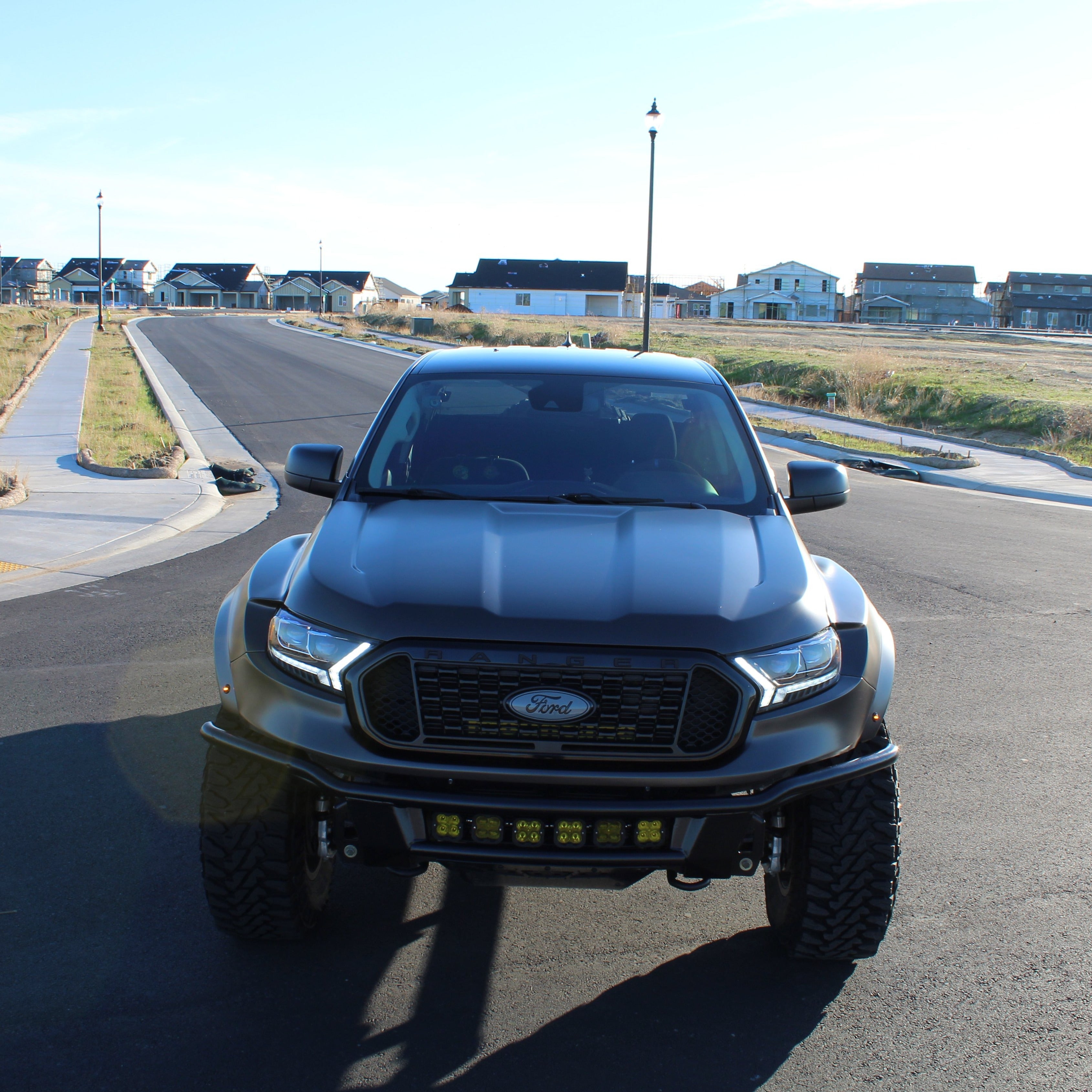 2019-2022 Ford Ranger fenders showcased on a modified truck parked on a street, highlighting offroad capabilities.