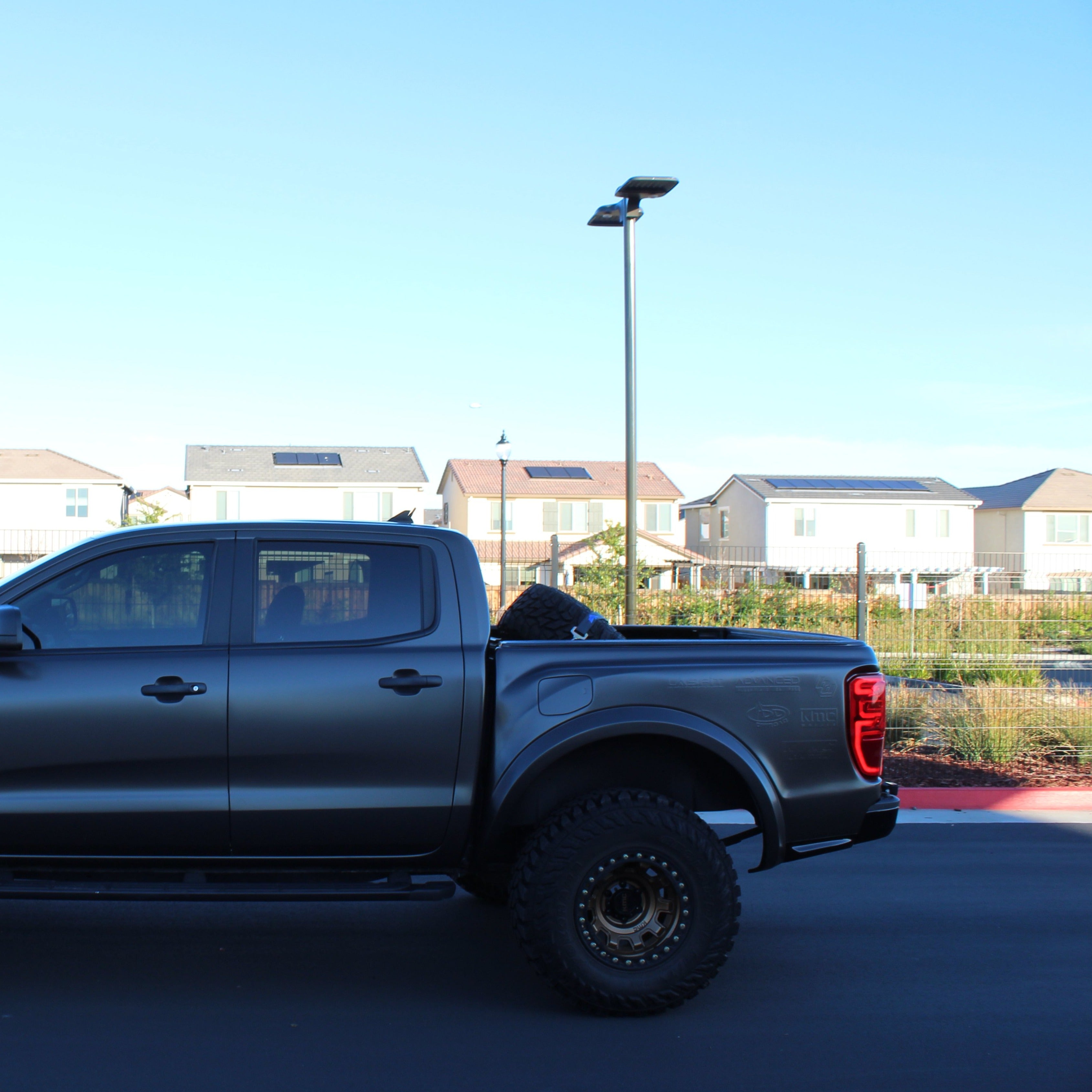 2019-2022 Ford Ranger with custom bedsides showcasing a rugged offroad design and enhanced tire clearance.