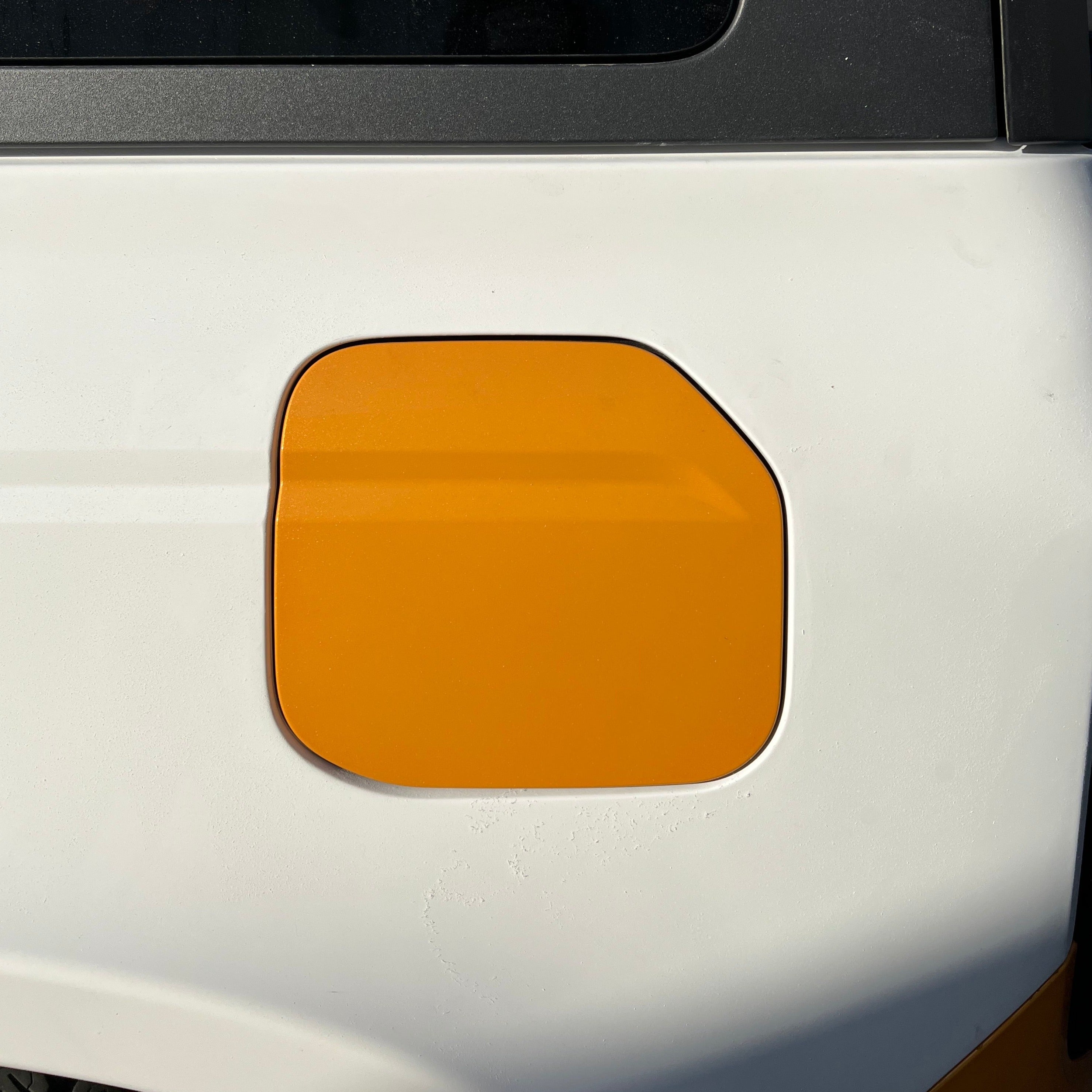 2021-2022 Ford Bronco 2-Door Rear Quarter Kit featuring a sleek design with an orange accent panel.