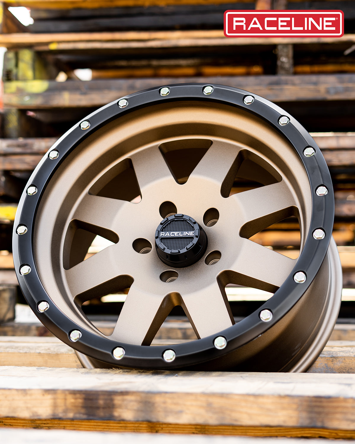935BZ Defender wheel by Raceline featuring a bronze finish and black beadlock ring, ideal for offroad vehicles.