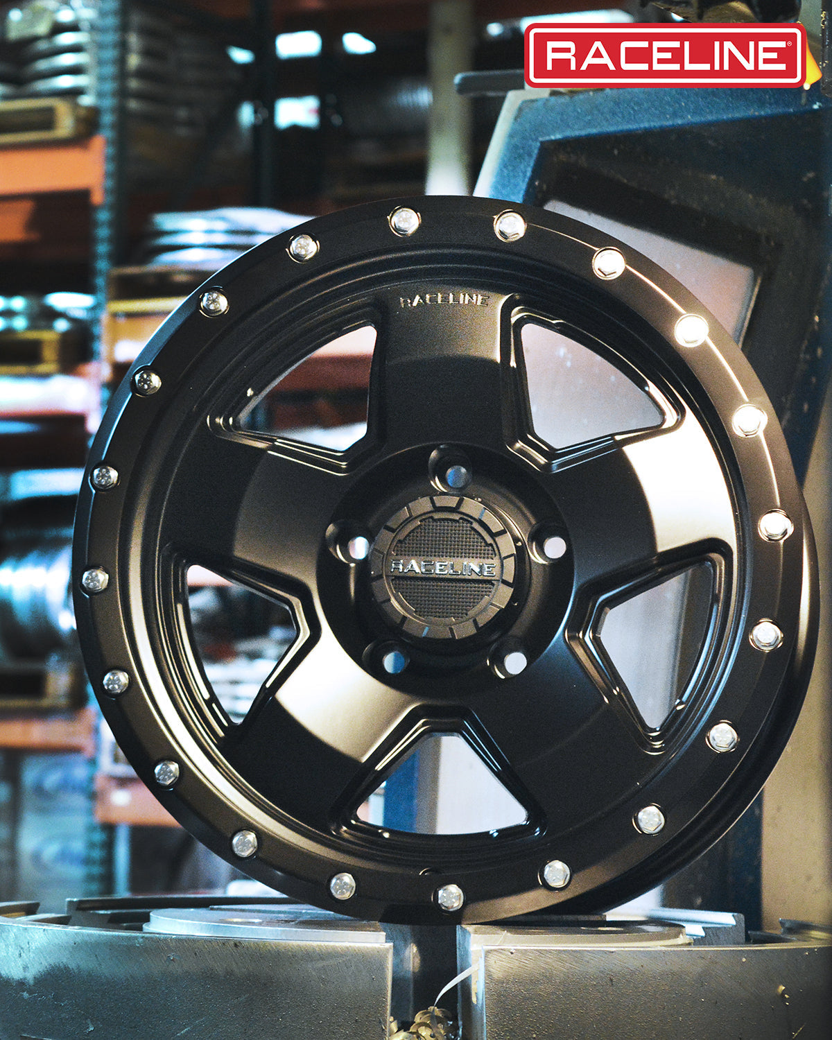 Black Raceline 937B Combat wheel featuring a bold design with chrome accents, ideal for offroad vehicles.