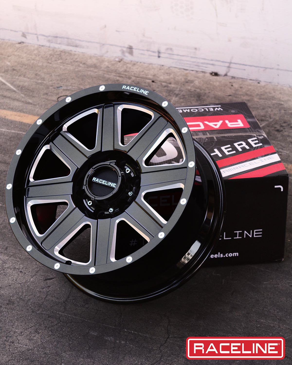 Black and machined 940M Hostage wheel by Raceline, showcasing a sleek design with multiple spokes and a polished finish.