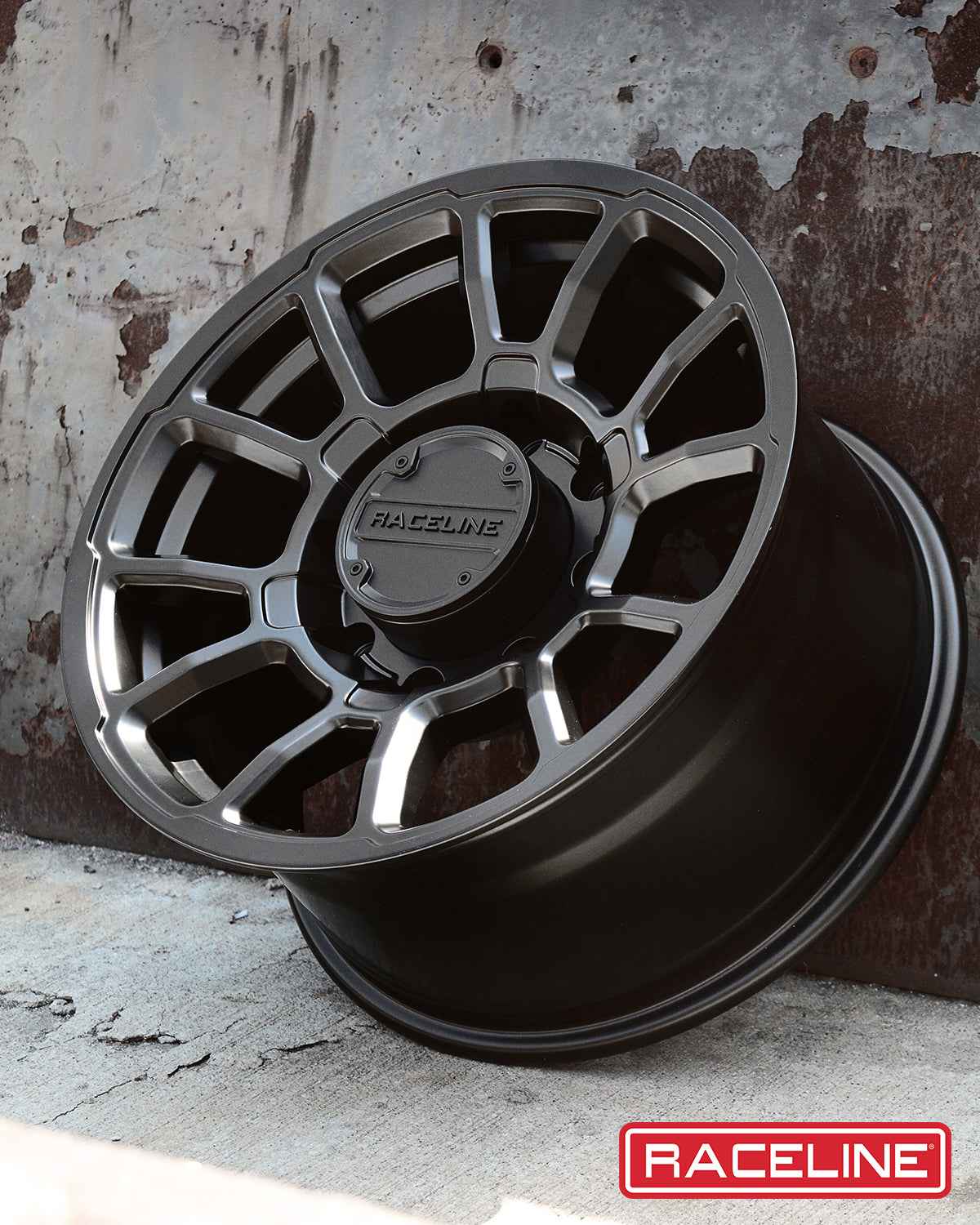 950B Gauge wheel by Raceline showcasing a sleek black finish and intricate design, ideal for offroad vehicles.