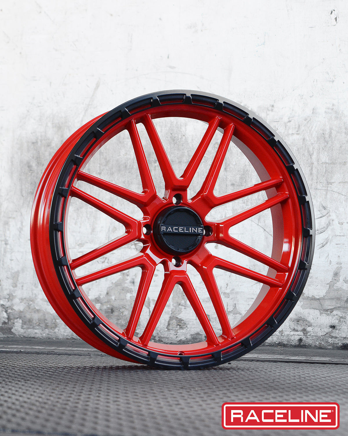 Red A11R Krank XL wheel with a sleek design and black accents, showcasing a modern off-road aesthetic.