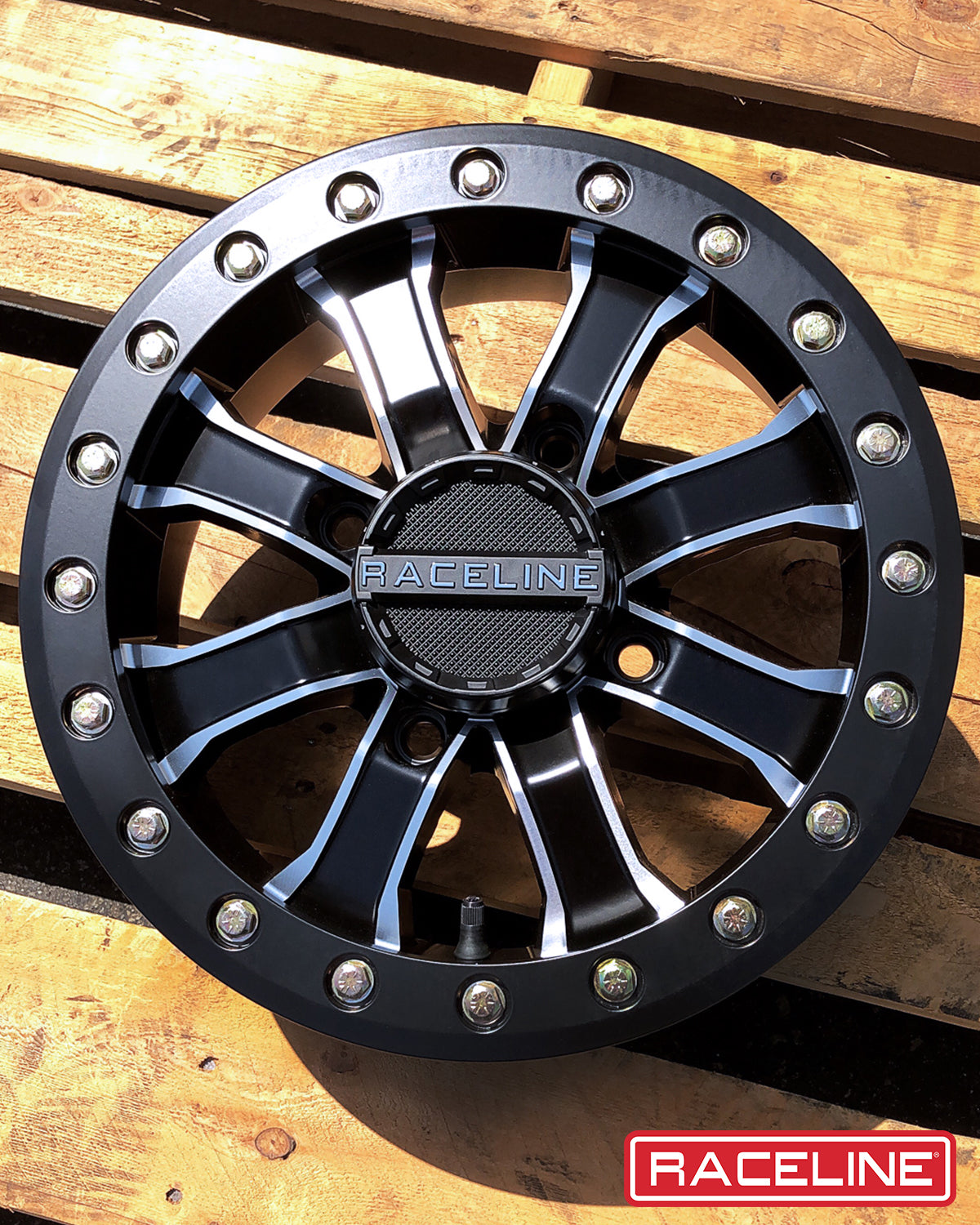 A71MB Mamba Beadlock wheel featuring a sleek black finish and polished accents, designed for offroad performance.