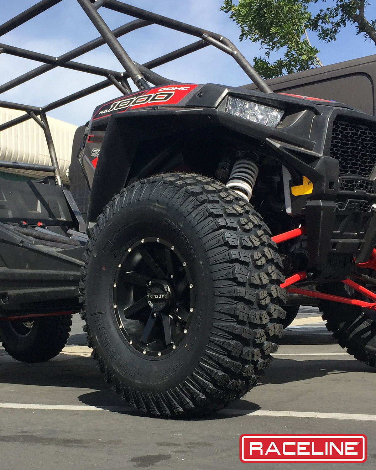 A82B Twist wheel mounted on an off-road vehicle, showcasing rugged tire tread and durable design for enhanced performance.