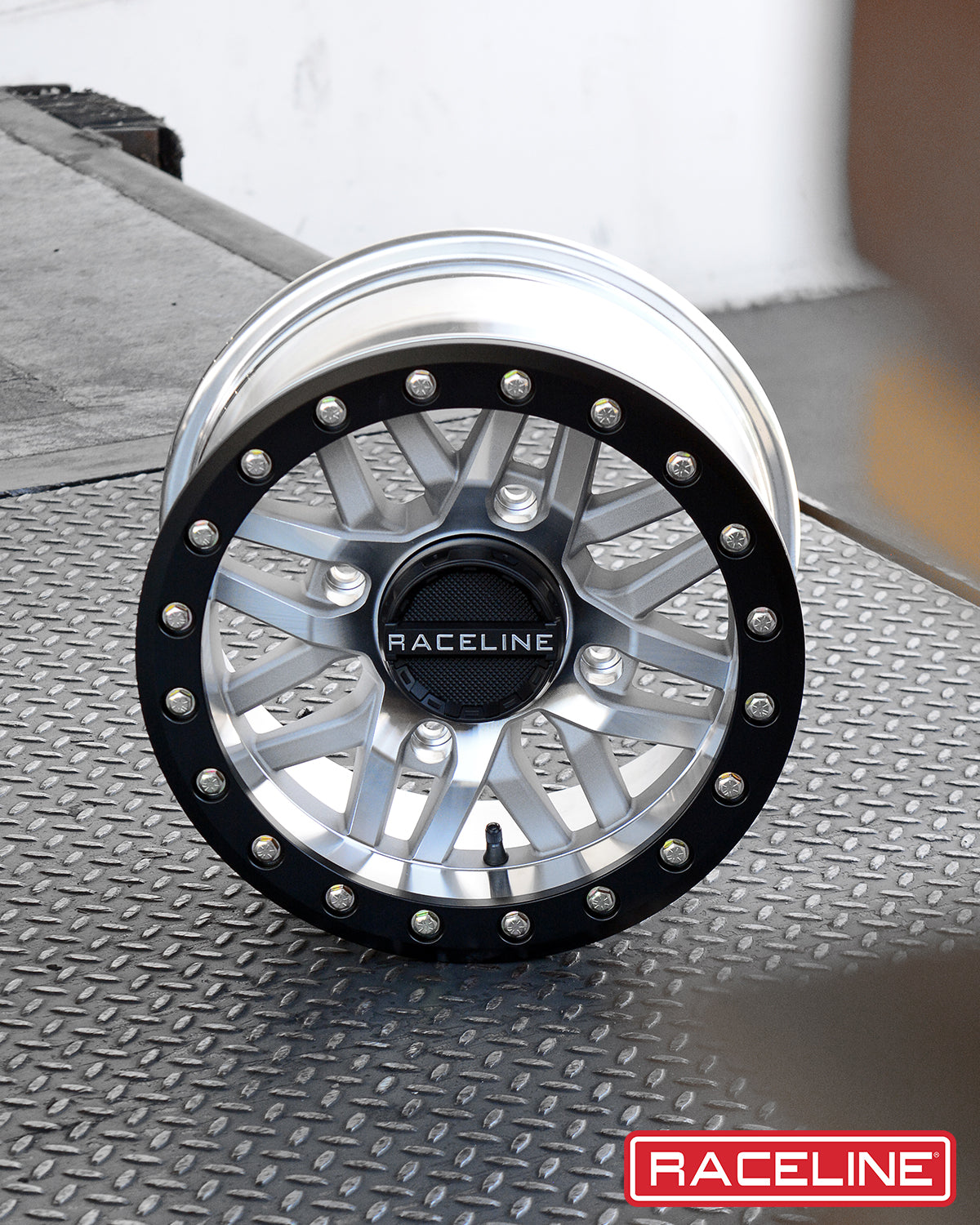 A91MA Ryno Beadlock wheel featuring a silver finish with a black beadlock ring and silver accents, ideal for offroad vehicles.