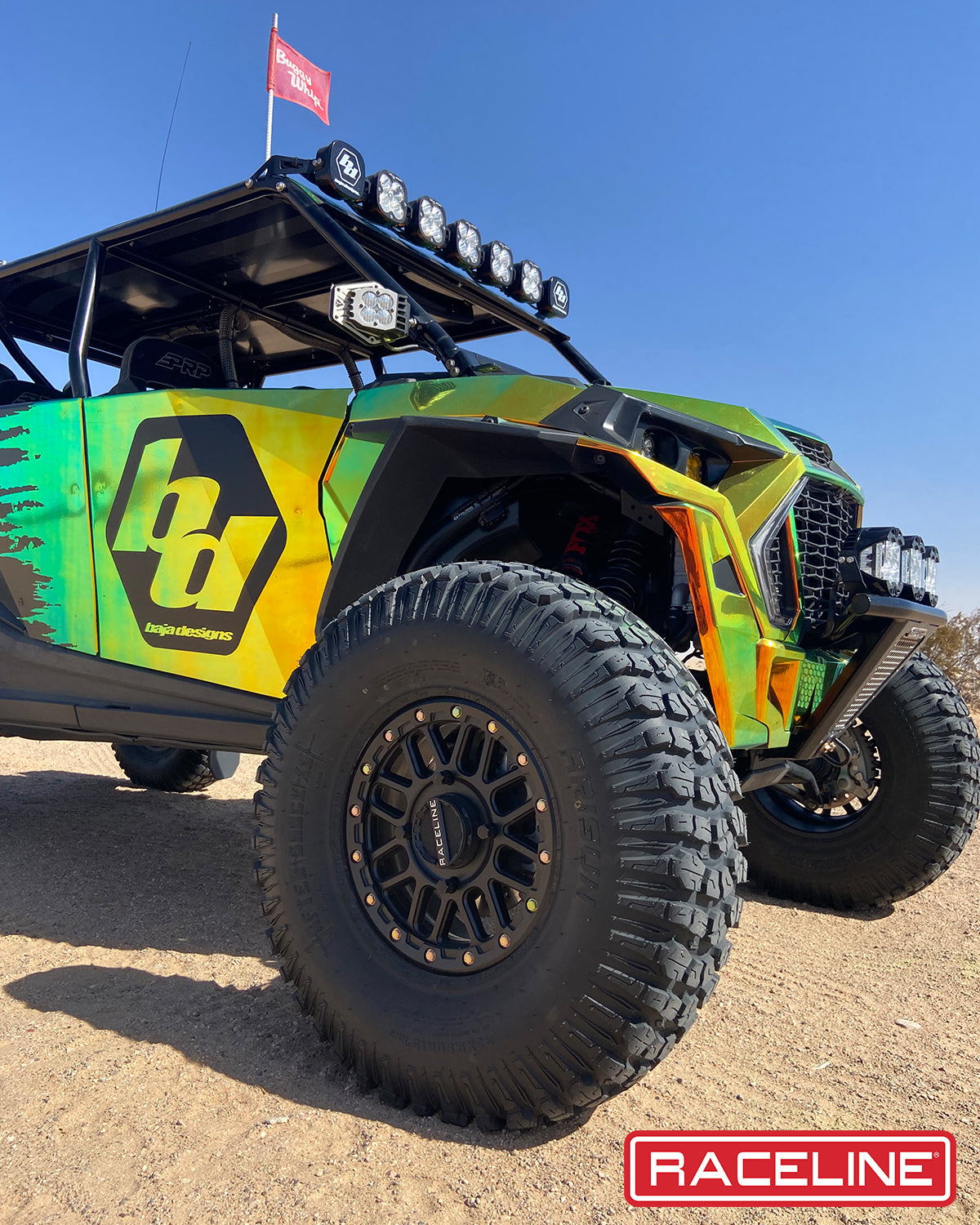 A93B Podium Beadlock wheel mounted on an offroad vehicle, showcasing rugged design and durable performance.