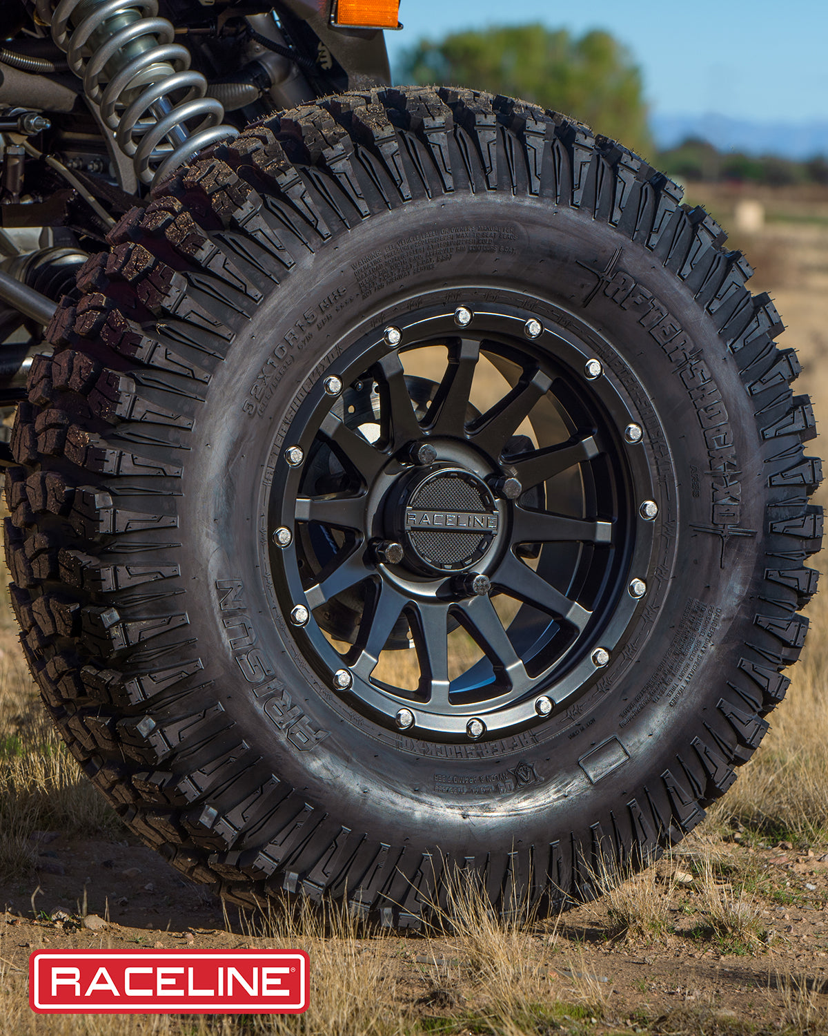 A95B Trophy Simulated Beadlock wheel showcasing rugged design and aggressive tread pattern, ideal for offroad vehicles.