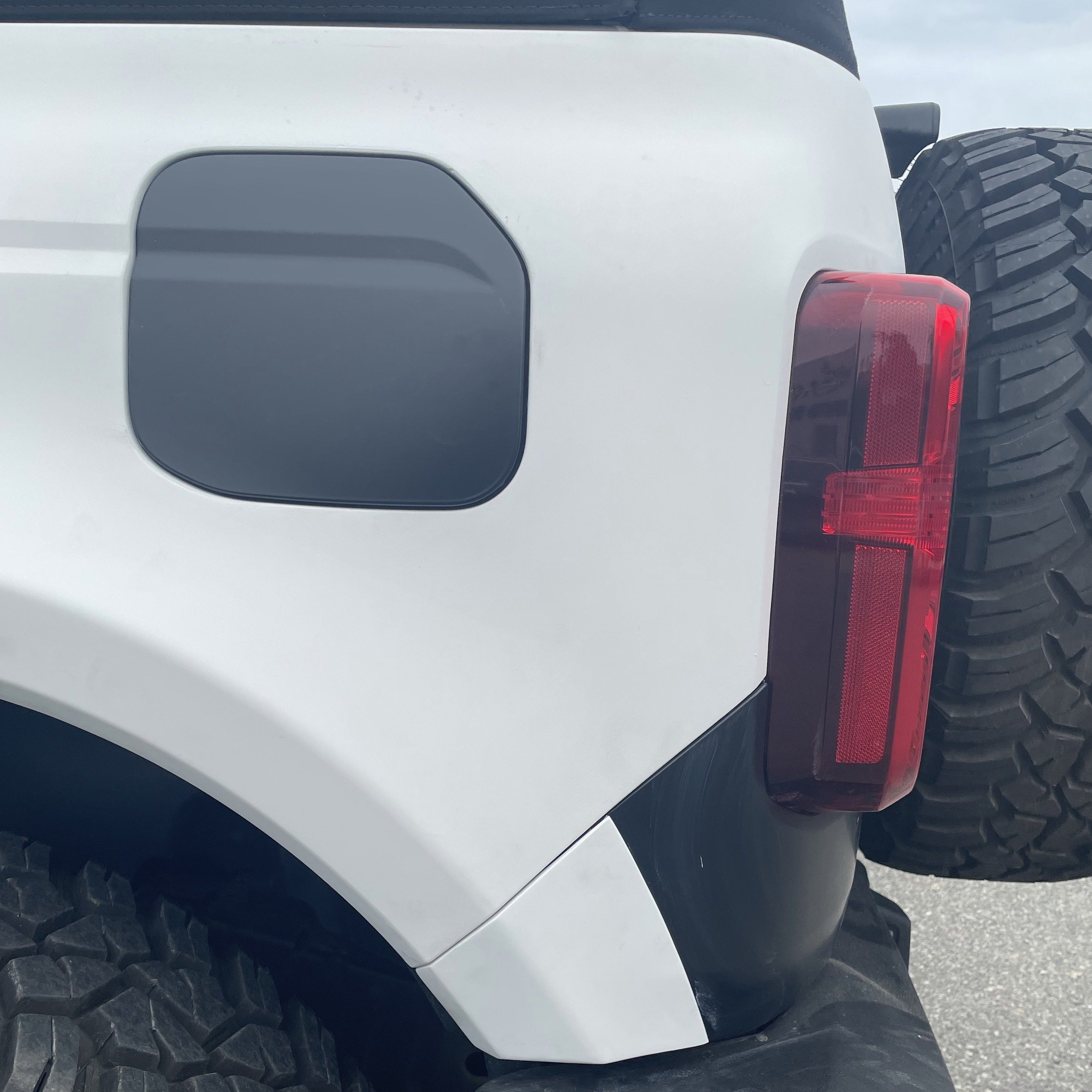 2021-2022 Ford Bronco 4-Door Rear Quarter Kit showcasing the rear panel and taillight on a white vehicle.