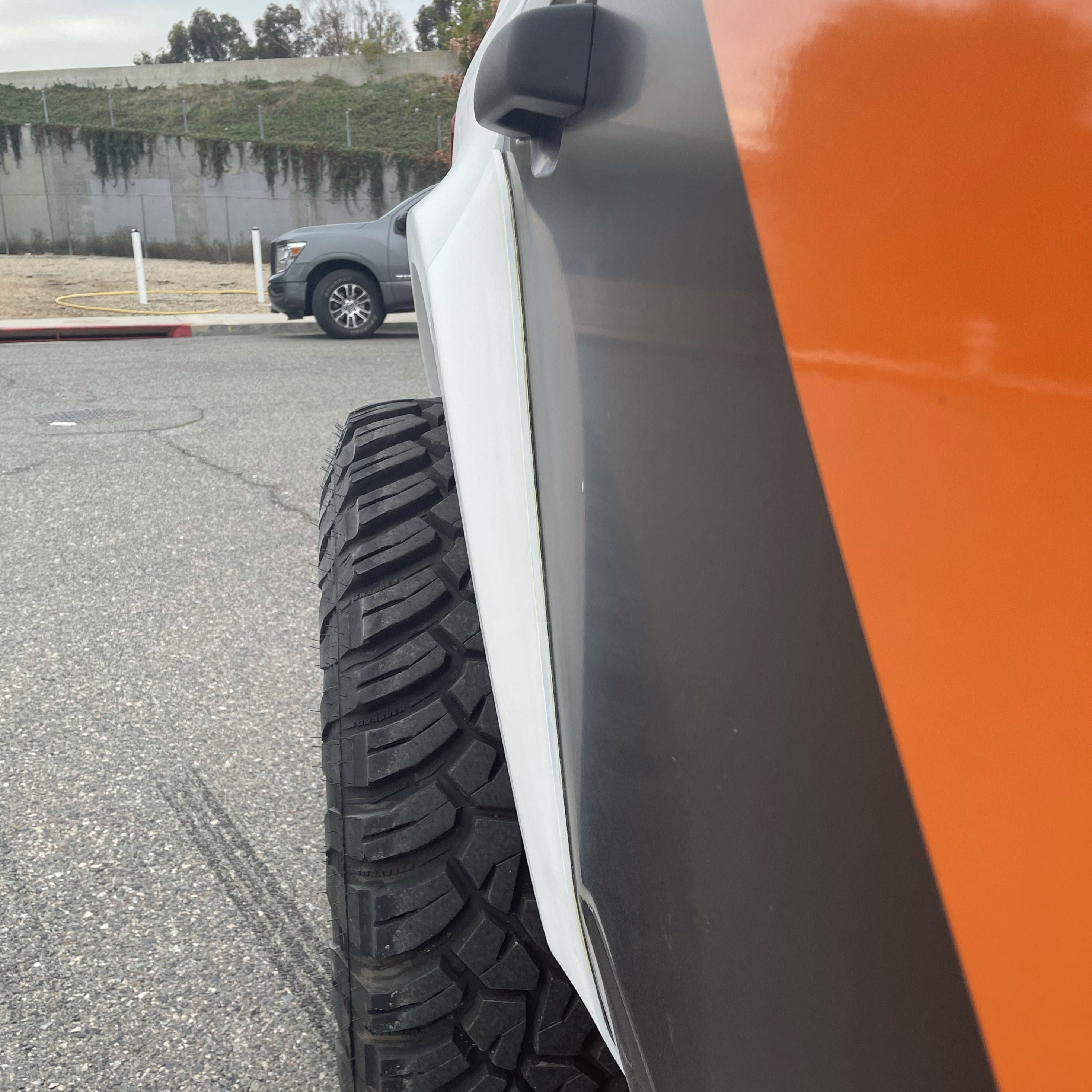 2021-2022 Ford Bronco 4-Door Rear Quarter Kit showcasing a close-up view of the tire and rear panel design.