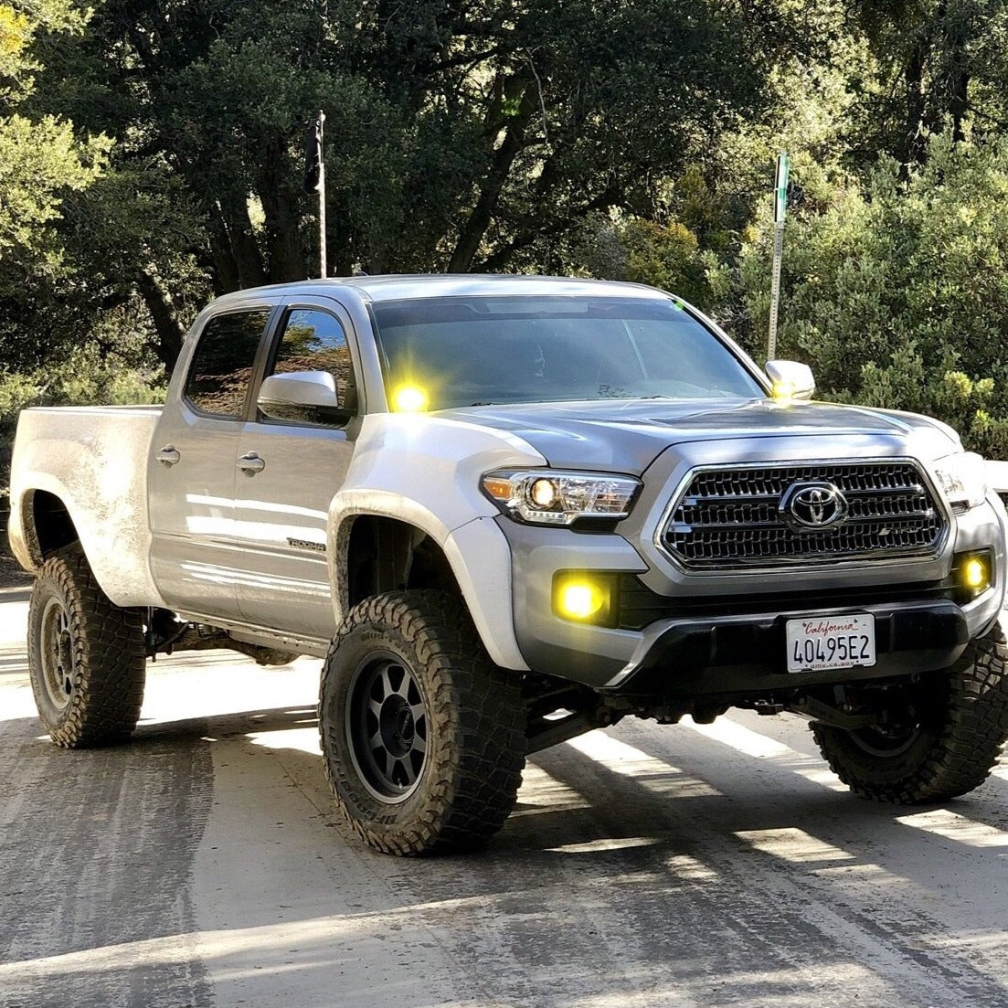 2016-2022 Toyota Tacoma with aftermarket fenders, showcasing an aggressive offroad look and enhanced tire clearance.
