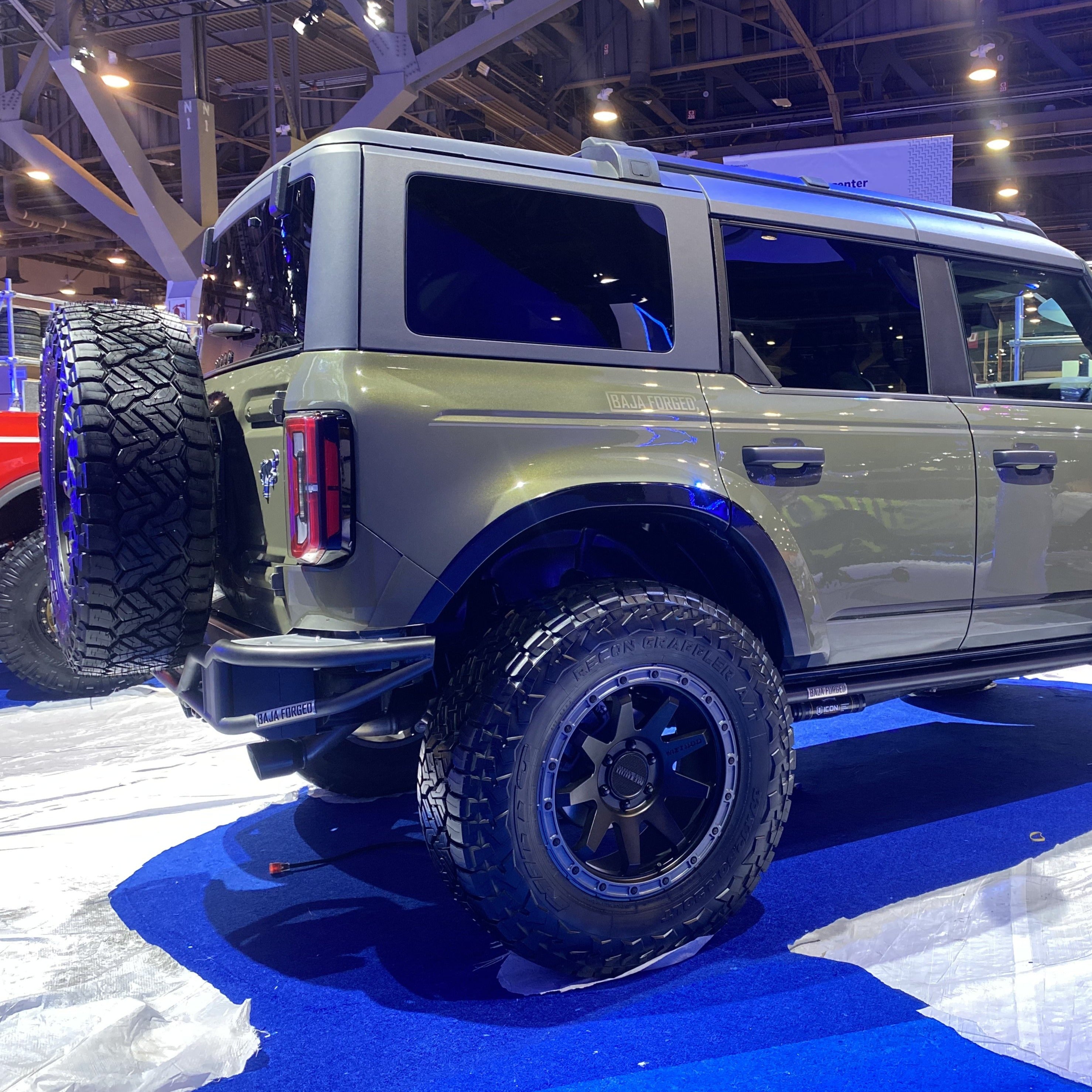2021-2022 Ford Bronco 4-Door Rear Quarter Kit displayed on a Bronco with off-road tires and rugged design.