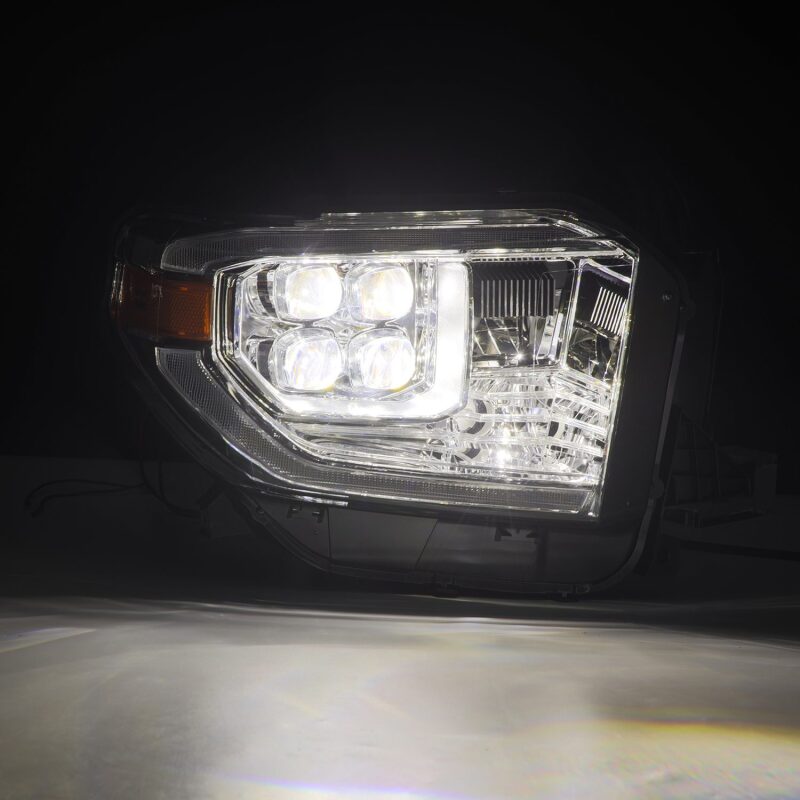 AlphaRex NOVA LED projector headlights for 2014-2021 Toyota Tundra with chrome finish, active light, and sequential signal.
