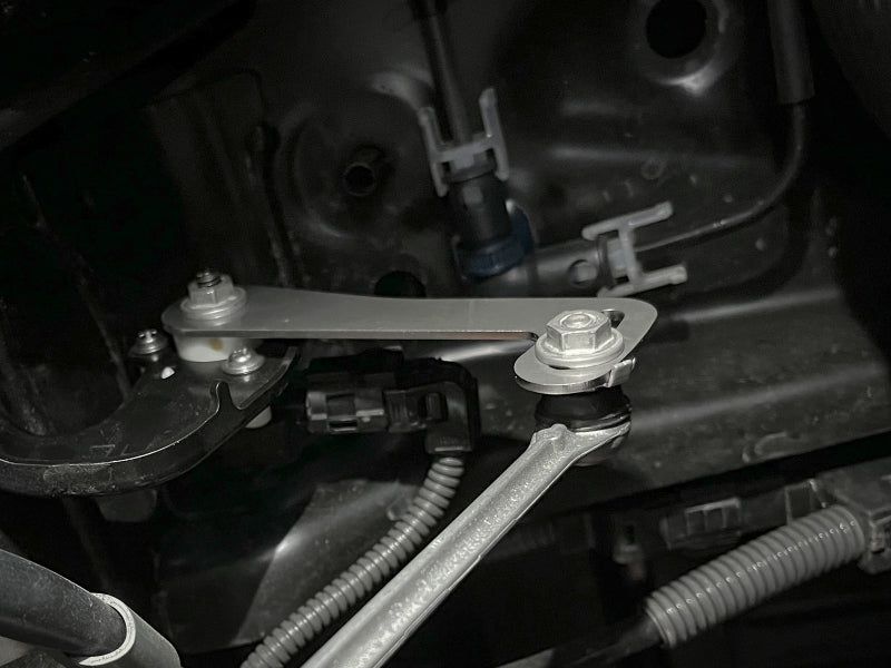 aFe 2022 Toyota Tundra V6-3.5L rear leveling kit components showcasing installation details and hardware.