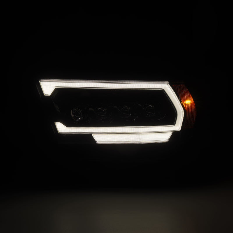 AlphaRex NOVA-Series LED projector headlight for 2019-2023 Dodge Ram 1500, featuring a sleek black design and bright illumination.