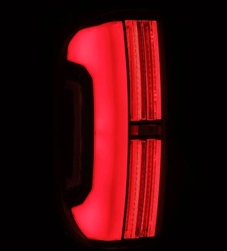 AlphaRex LED tail lights for 14-21 Toyota Tundra in black and red, featuring a sleek, modern design for enhanced visibility.