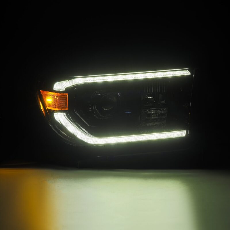 AlphaRex G2 PRO-Series projector headlights for 07-13 Toyota Tundra and 08-17 Sequoia with a sleek black finish.