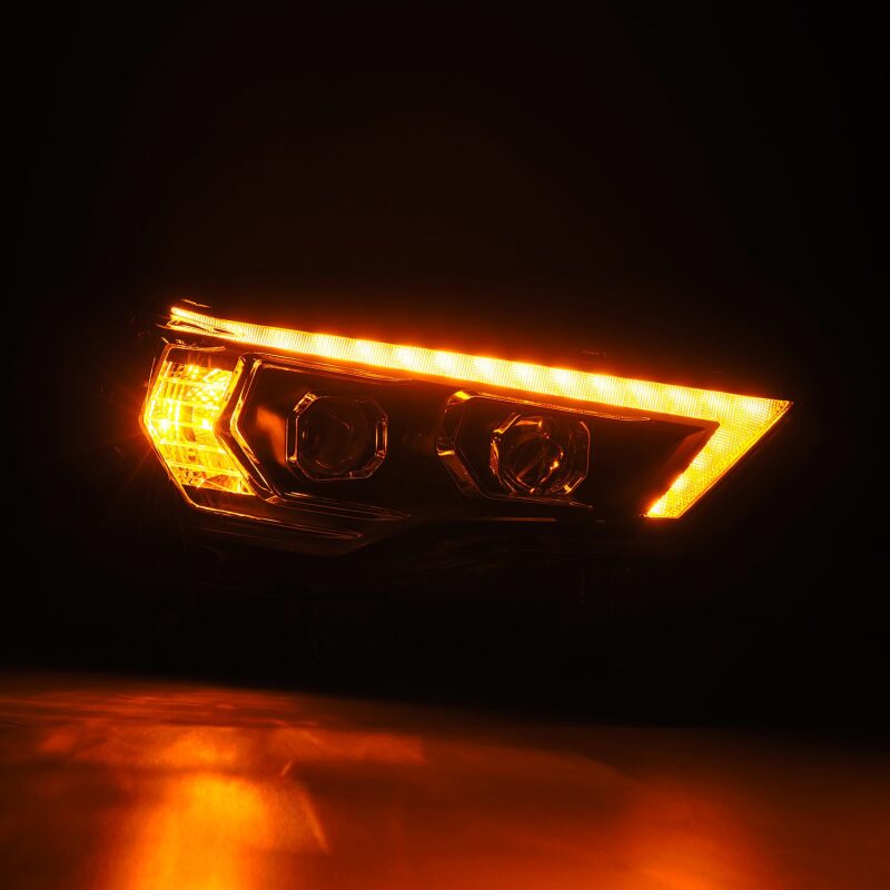 AlphaRex LUXX-Series LED projector headlights for 14-22 Toyota 4Runner, featuring black housing, sequential signals, and DRL.