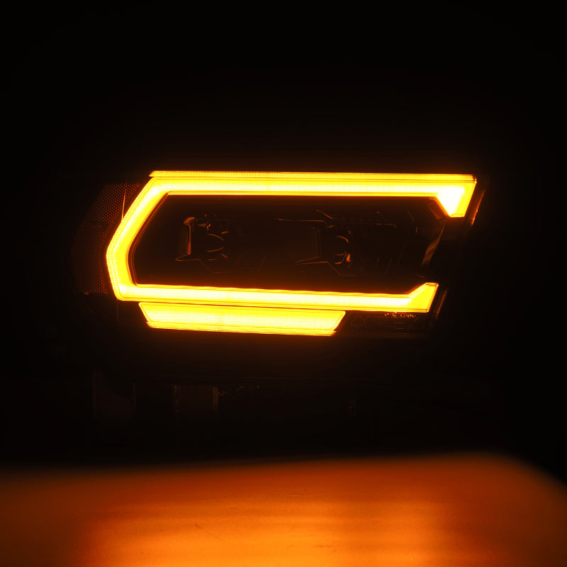 AlphaRex PRO-Series projector headlights for 2019-2022 Dodge Ram 1500 in alpha black with sequential signal and DRL.