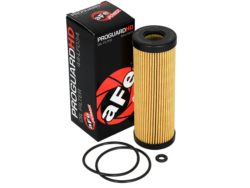 aFe ProGuard oil filter with a cylindrical filter element and packaging, designed for optimal engine protection and performance.