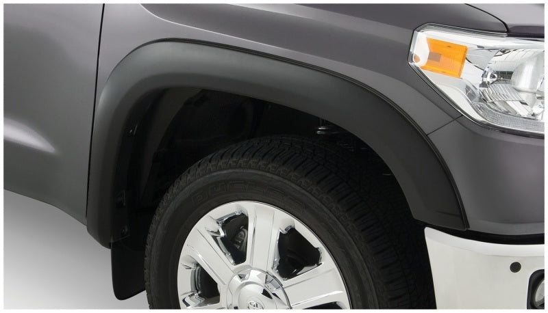 Bushwacker OE style flares for 07-13 Toyota Tundra, black finish, enhancing tire coverage and protection.