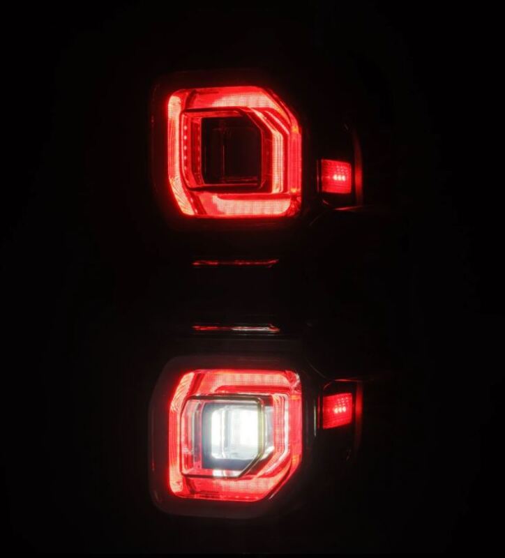 AlphaRex NOVA LED tail lights for 2021-2024 Ford Bronco in Alpha-Black, showcasing a sleek design with bright red illumination.