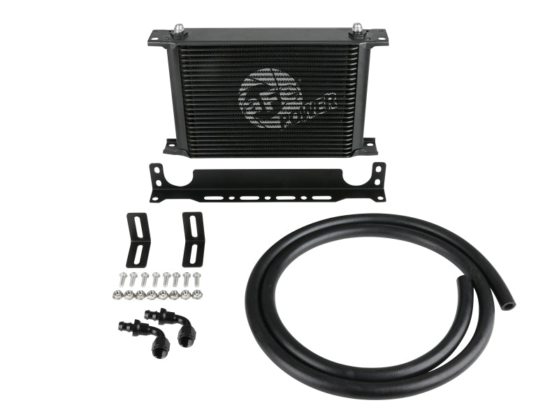 AFE BladeRunner oil cooler kit featuring a 10x2x8 inch cooler, mounting brackets, hoses, and installation hardware.