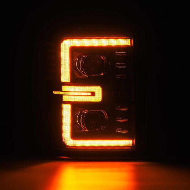 AlphaRex LUXX-Series LED projector headlights for 08-10 Ford F250-550, featuring black housing and sequential signals.