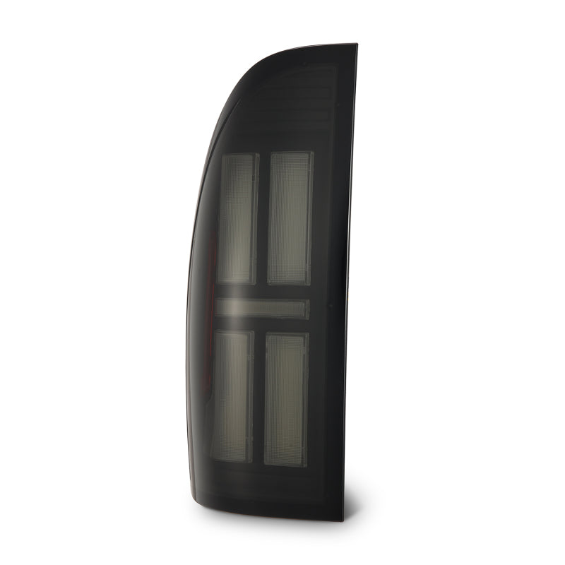 AlphaRex NOVA LED tail light for 2005-2015 Toyota Tacoma in black, featuring a sleek design and modern LED technology.