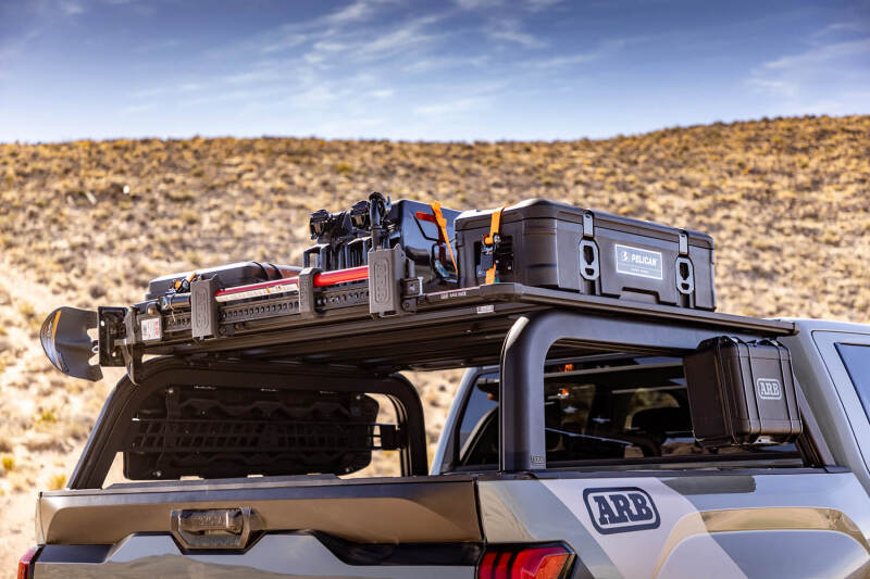 ARB 22-25 Toyota Tundra Bed Rack showcasing gear and storage solutions on a truck, ideal for offroad adventures.
