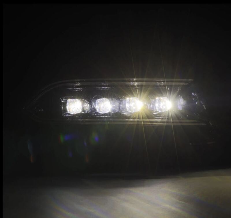 AlphaRex NOVA-Series LED projector headlights for 2015-2023 Dodge Charger, featuring black housing and sequential signals.