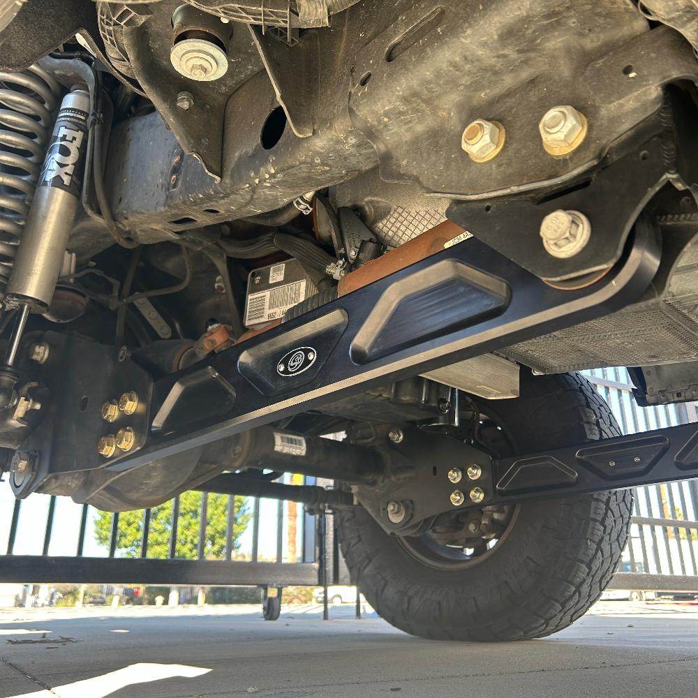 Aluminum beam arms for 2005-2022 Super Duty, showcasing durable construction and enhanced off-road performance.