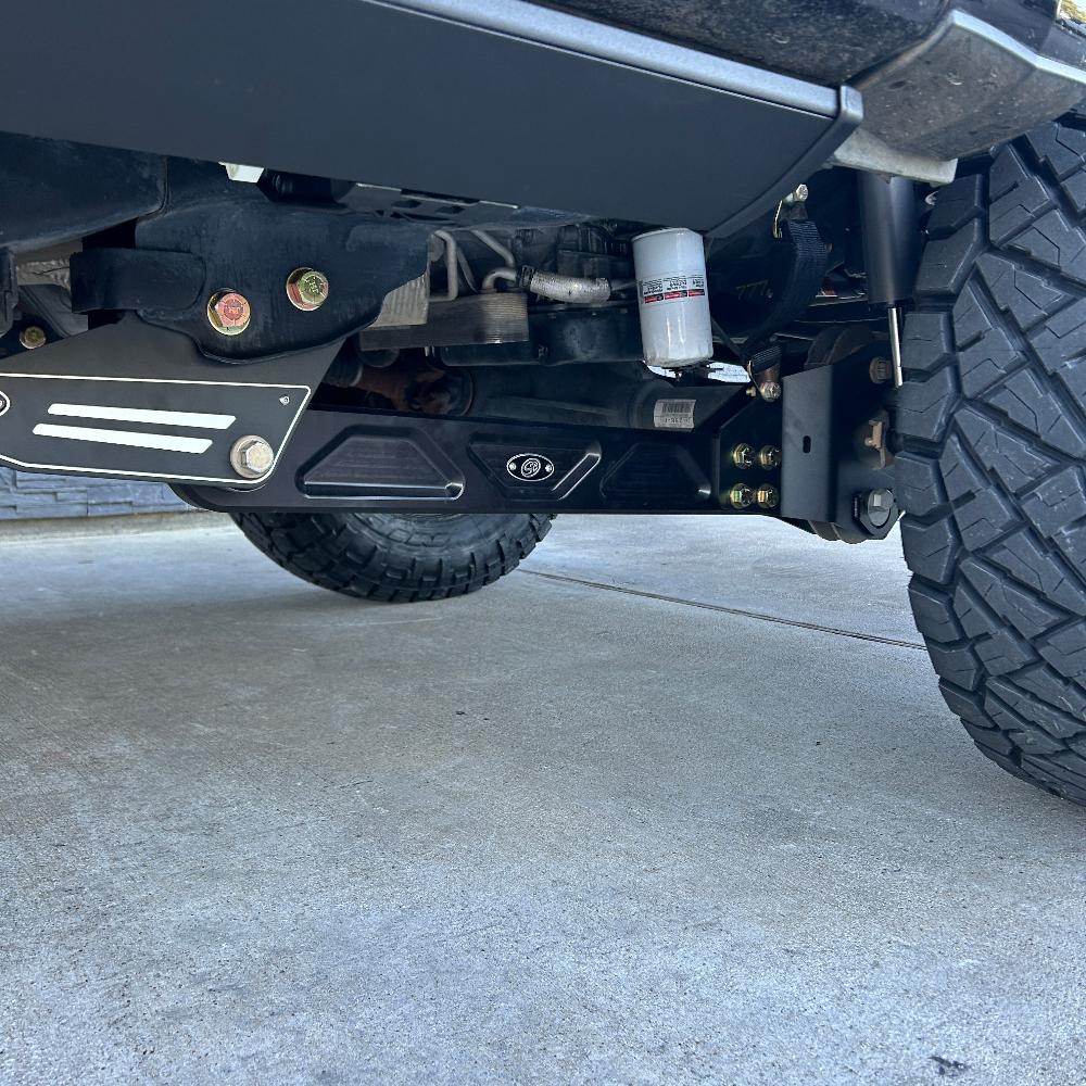 Aluminum beam arms for 2005-2022 Super Duty, showcasing durable construction and enhanced off-road performance.
