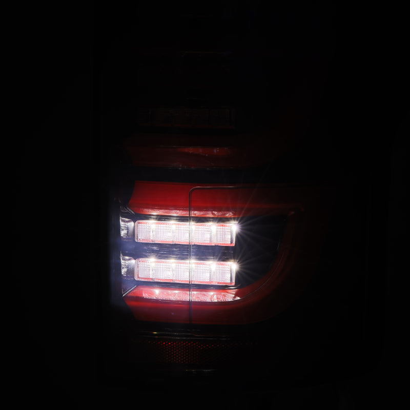 AlphaRex Luxx LED tail lights for 2015-2020 Ford F-150 in black and red, designed for enhanced visibility and style.