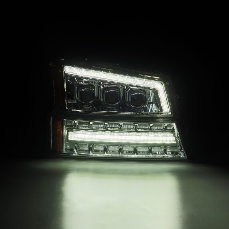 AlphaRex Chrome NOVA LED projector headlights for 03-06 Chevy Silverado and Avalanche, showcasing a sleek design and bright illumination.