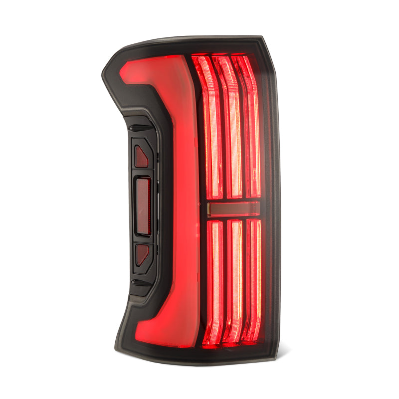 AlphaRex NOVA-Series LED prismatic tail light for 24-25 Toyota Tacoma in alpha-black finish, featuring a sleek design.