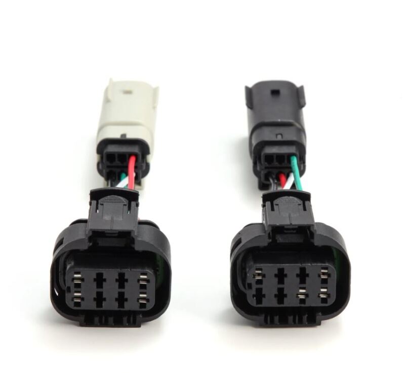 AlphaRex LUXX-Series tail light converters for upgrading from stock halogen tail lights, featuring dual connectors.
