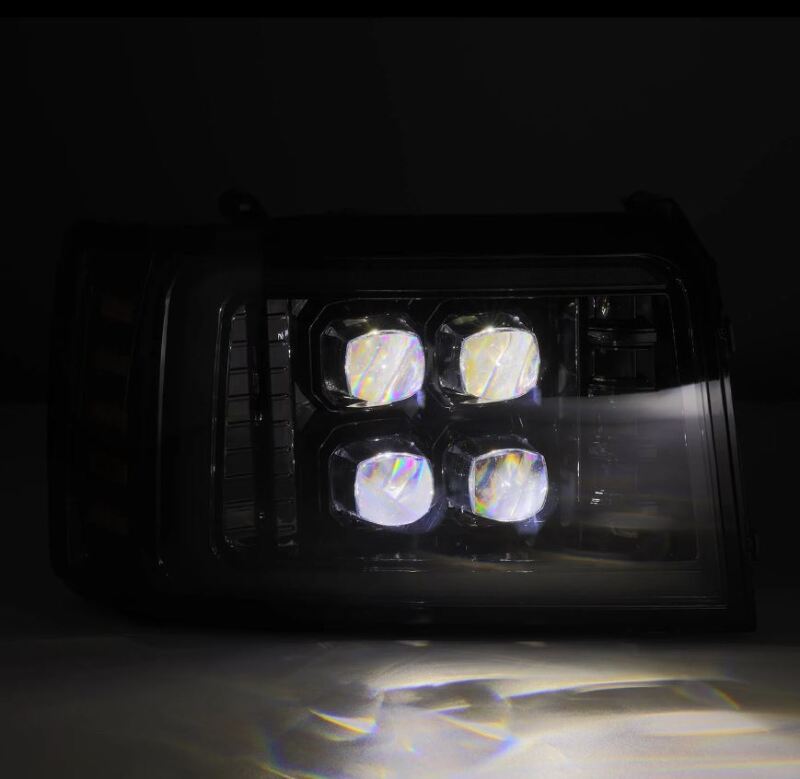 AlphaRex NOVA-Series LED projector headlight for 92-96 Ford F-Series/Bronco in black with active light and daytime running lights.