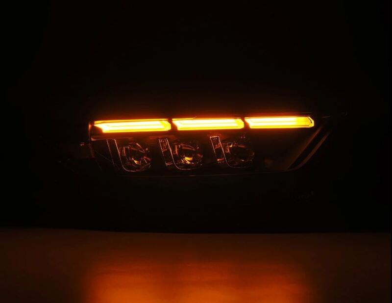 AlphaRex NOVA LED projector headlights for 15-17 Ford Mustang, featuring black housing and sequential signal lights.