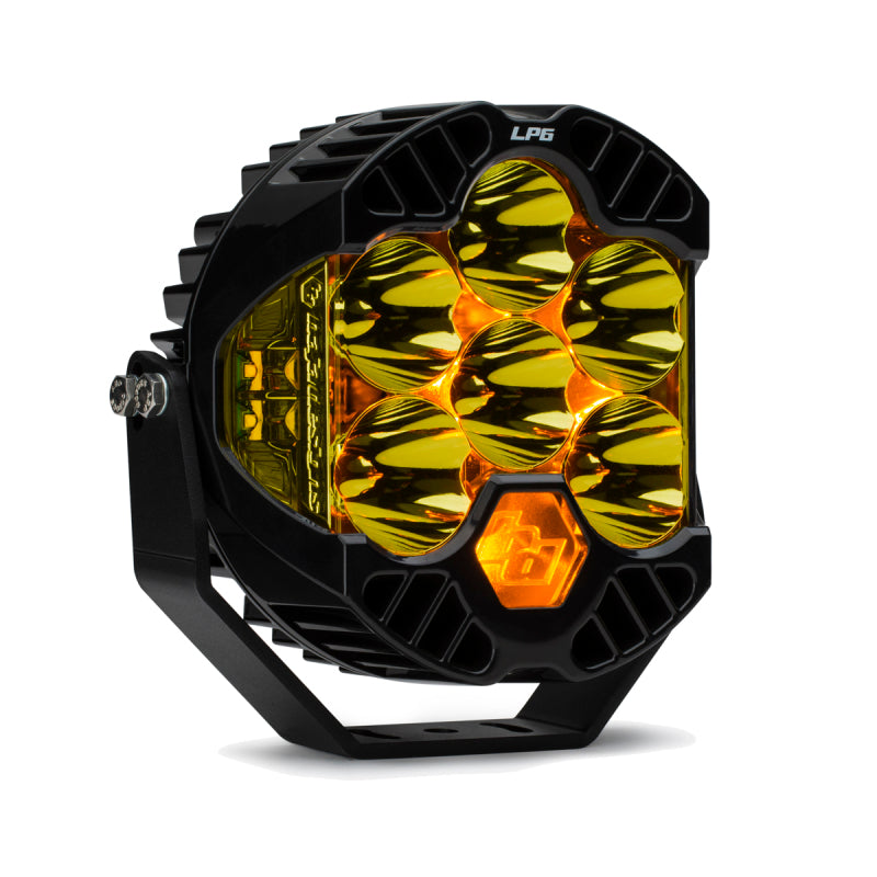 Baja Designs LP6 Pro Spot LED light in amber, featuring a sleek design with six powerful LED bulbs for enhanced visibility.
