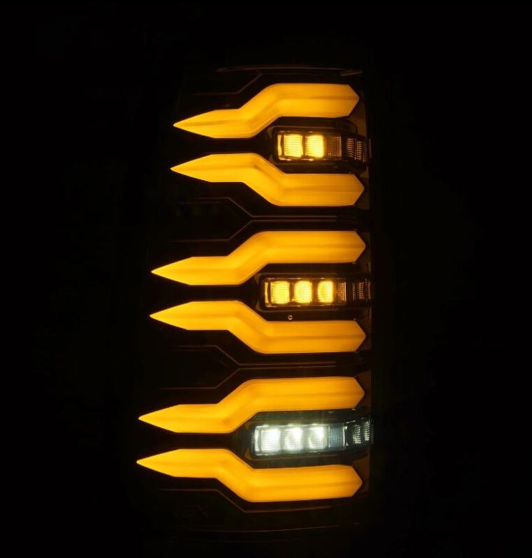 AlphaRex LUXX-Series LED tail lights for 99-06 Chevrolet Silverado and GMC Sierra in black, featuring a sleek design with bright amber and white LEDs.