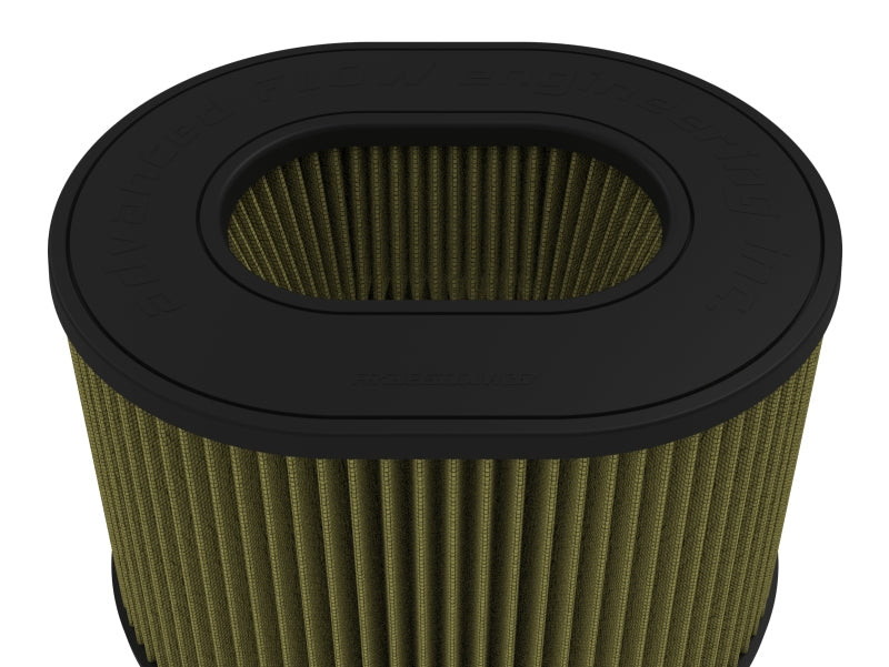 afe Magnum FORCE replacement air filter with an oval design, featuring a textured surface and pleated filter media for enhanced airflow.