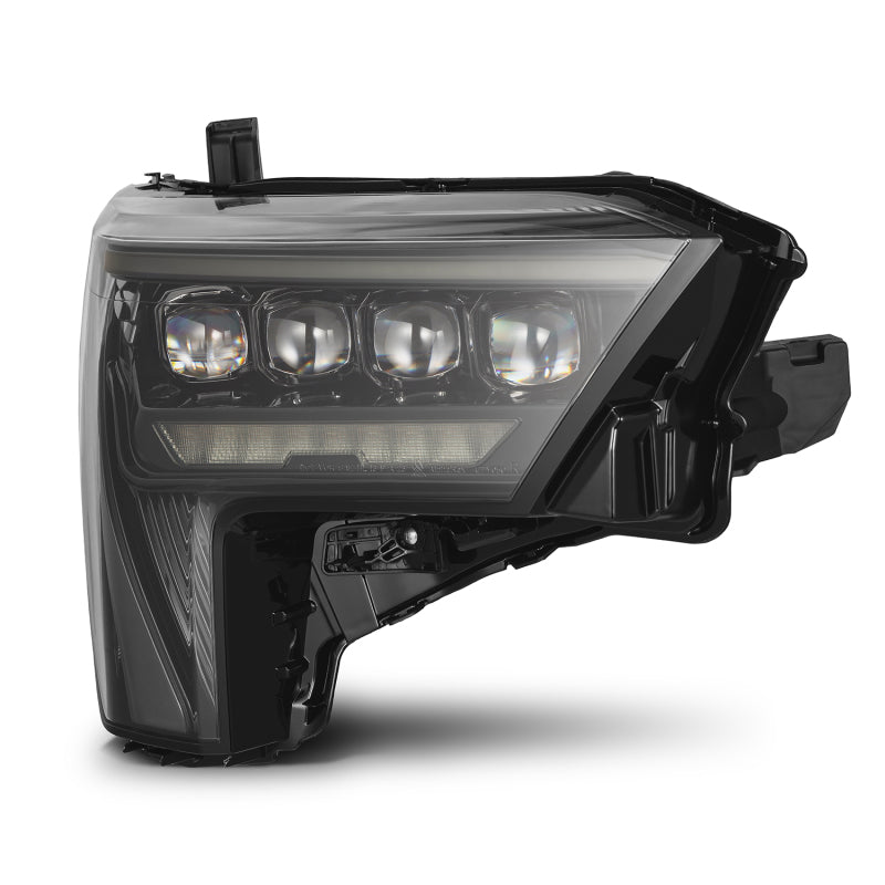 AlphaRex NOVA-Series headlights for 2022-2023 Toyota Tundra in alpha-black with amber daytime running lights.