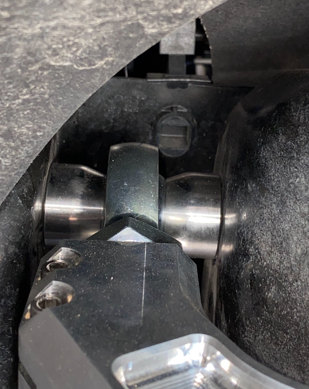 Close-up of a 2015-2024 Ford F-150 billet upper control arm kit showing stock length components and installation details.