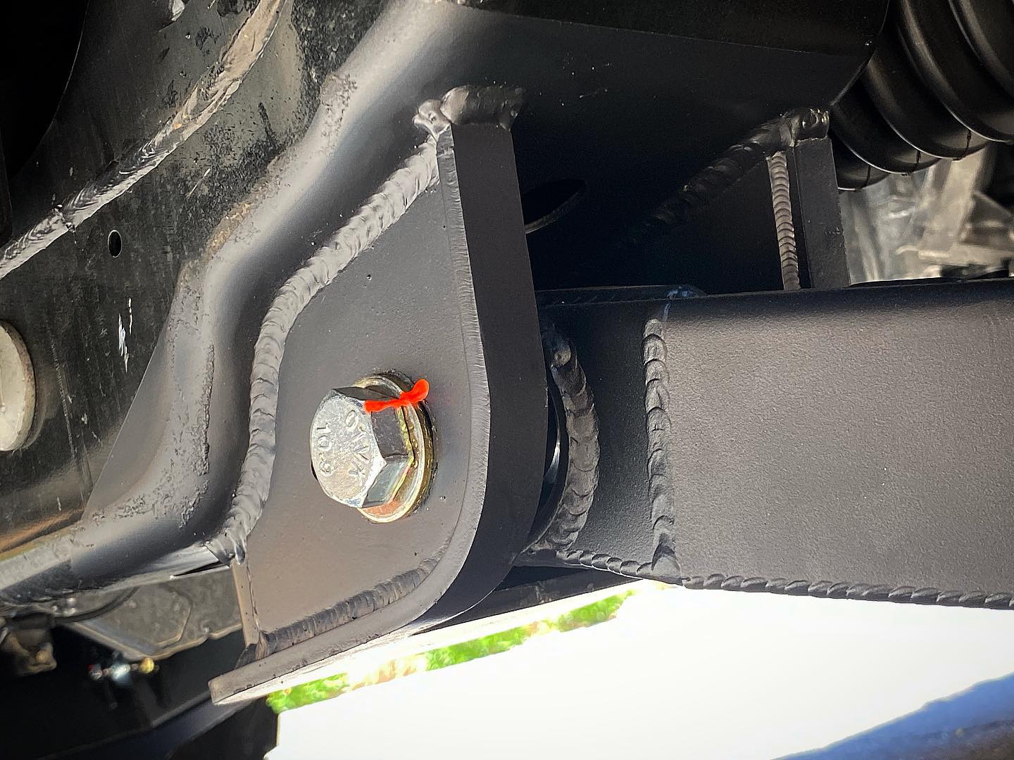 Lower arm pocket replacement kit for 2017-2024 Raptor by Foutz Motorsports, showcasing durable welds and hardware.